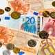 A collection of old Greek drachma and euro notes and coins, pictured in Brussels, in 2012.